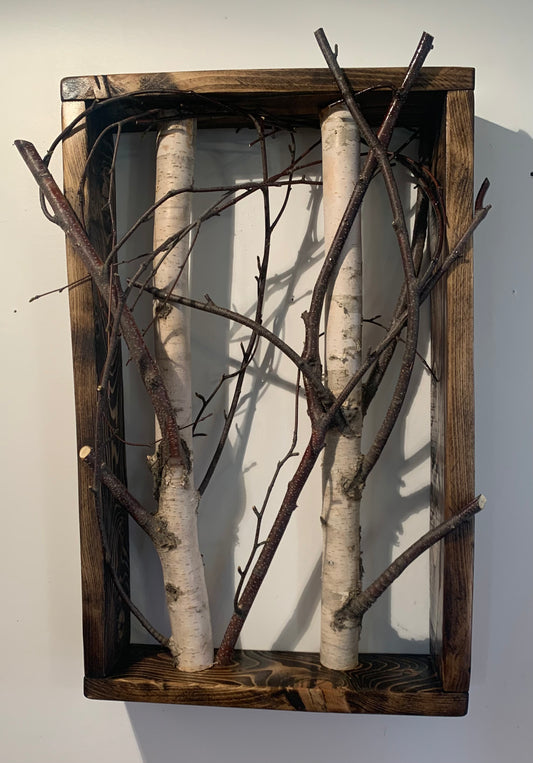 Birch branch shadow box wall decor featuring natural textures and earthy tones, perfect for adding a rustic touch to any interior space